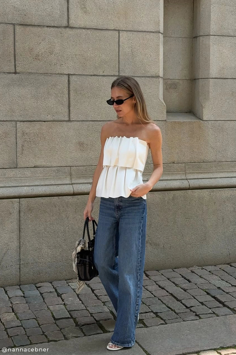 Sculpted tube top and Loose-fit straight jeans