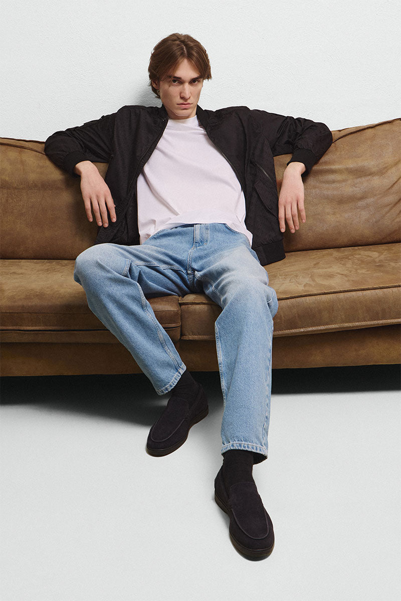 Logo-pattern bomber jacket COURVILLE and Tapered jeans RYDER