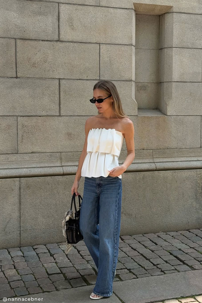Sculpted tube top and Baggy fit denim jeans