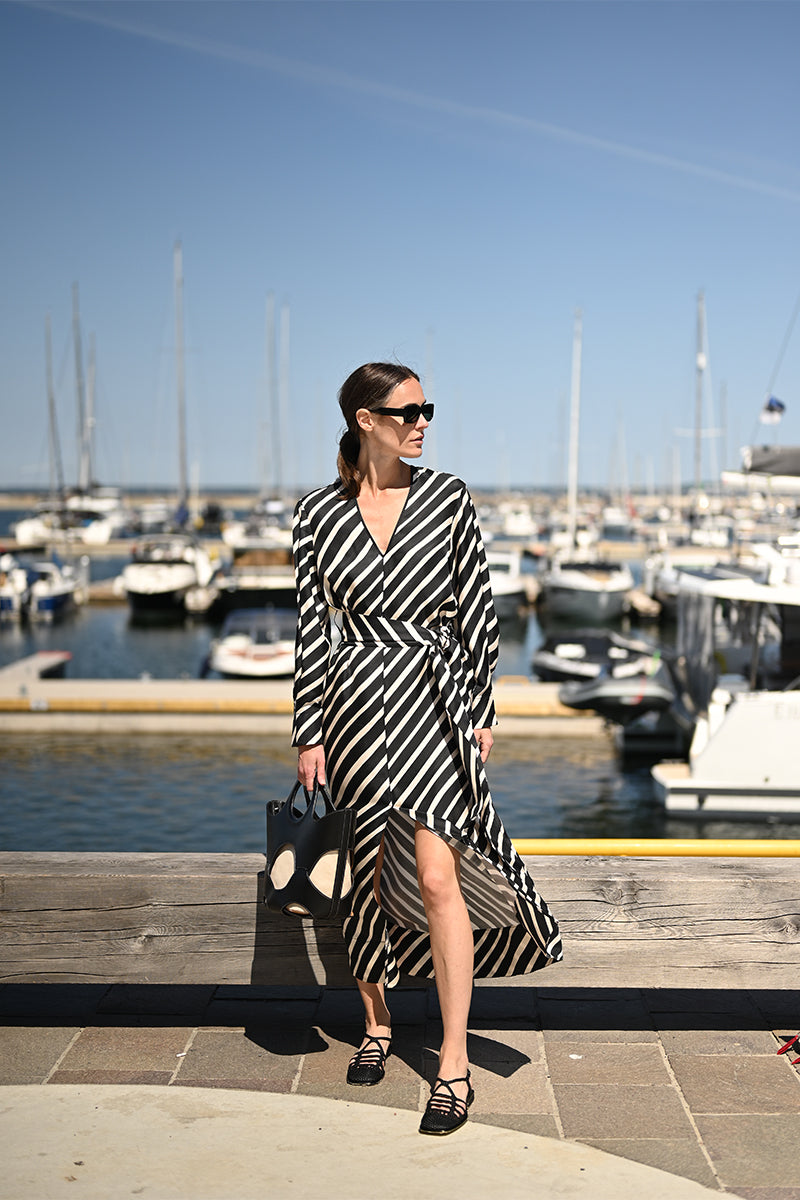 Silk v-neck dress and Cut-out leather bag ONADA