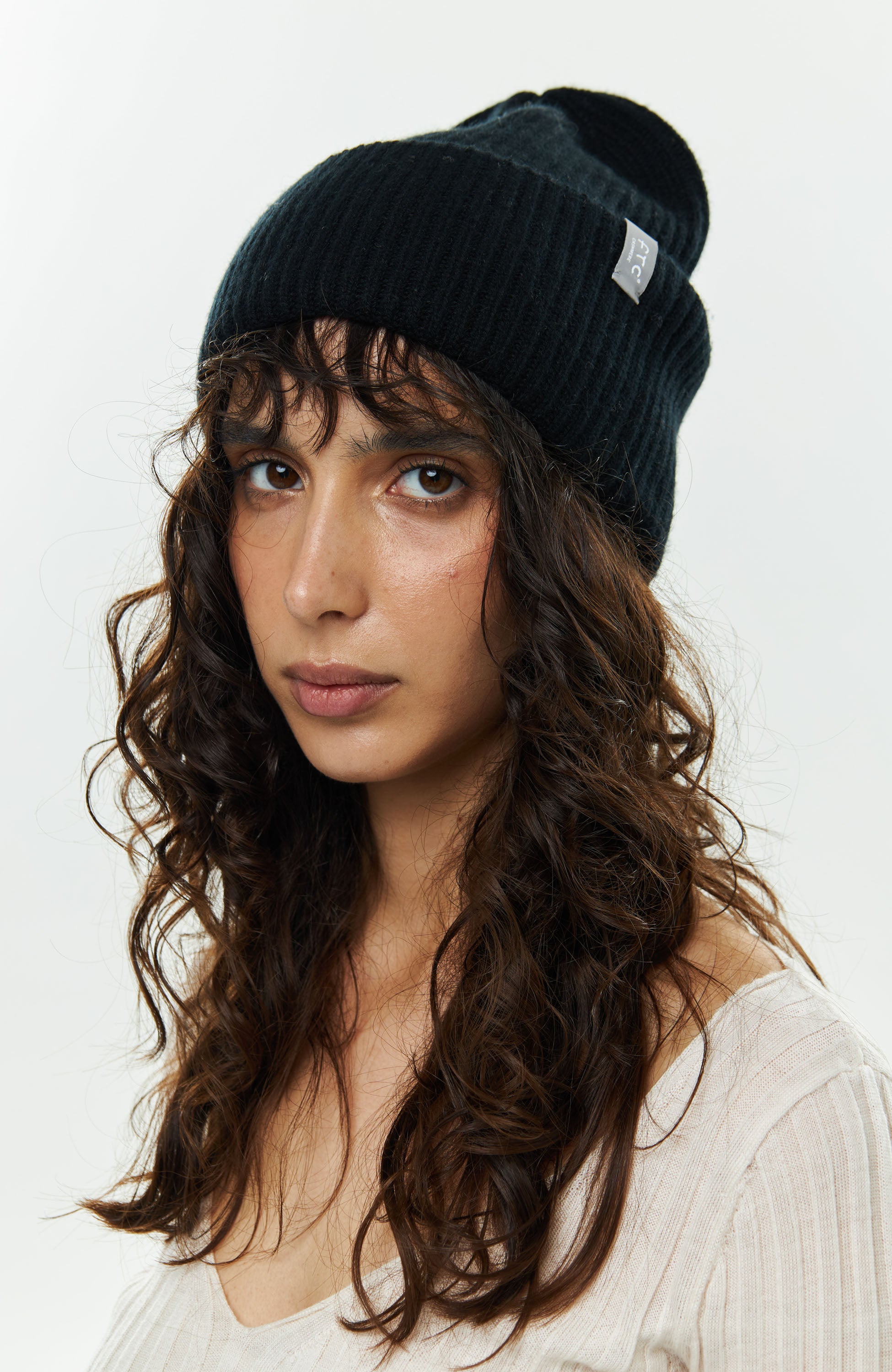 Kootud beanie-müts