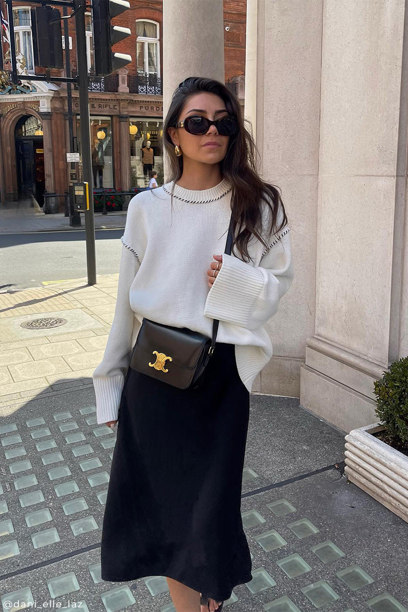 Stitched crewneck pullover and Tailored maxi skirt