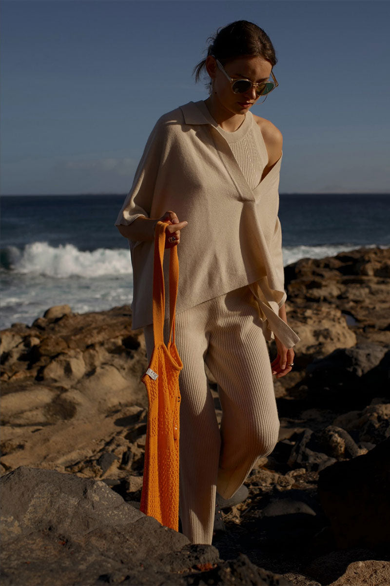 Ribbed racerback top and Belt-waisted ribbed trousers