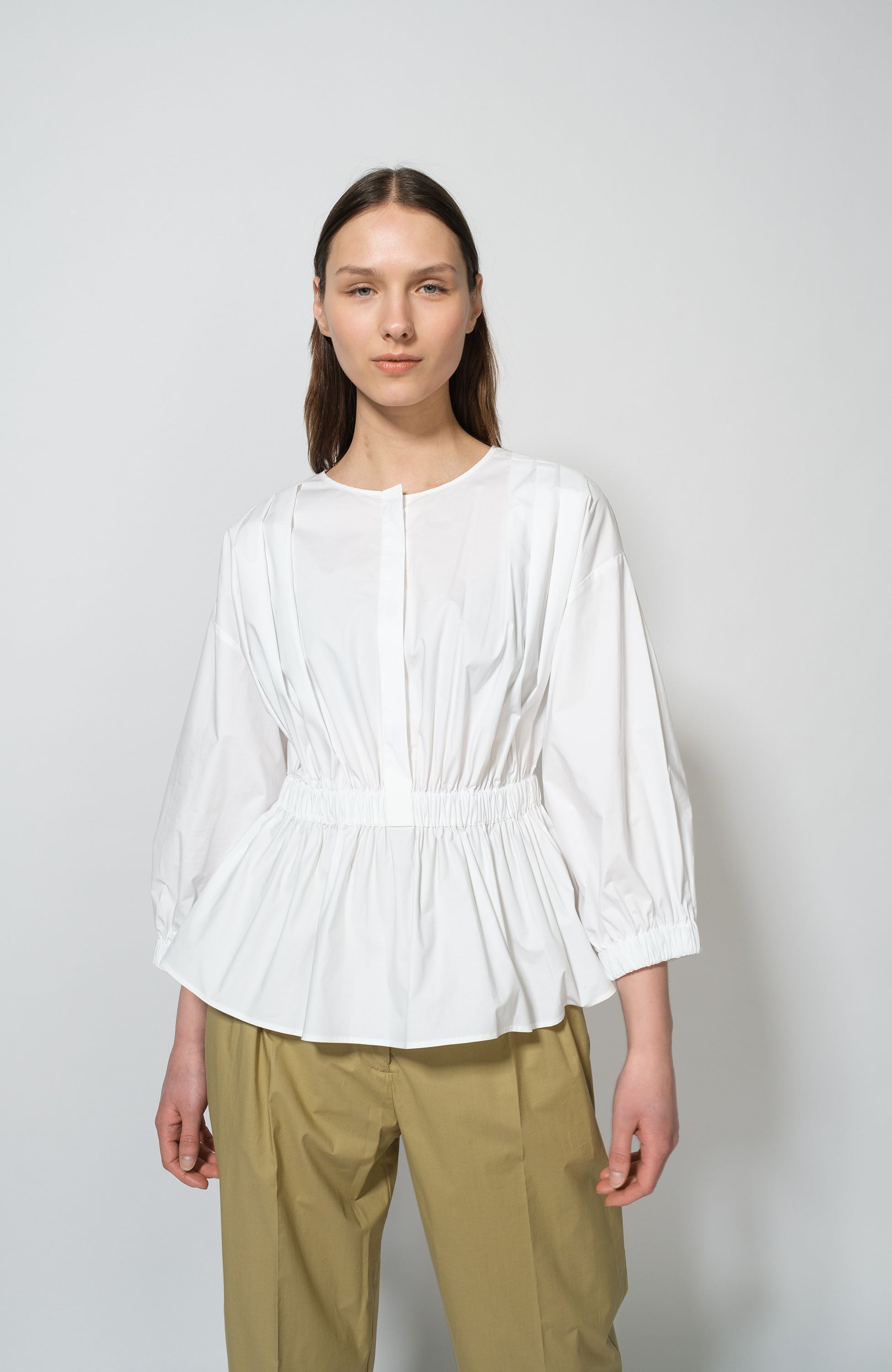 Peplum-hem cotton blouse